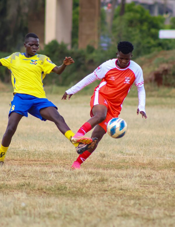 Kayole Starlets Nuru Hadima vies for the ball against Vihiga Queens Martha Amunyolet