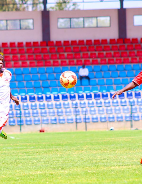 Kayole Starlet's Magneta Ocharo vies for the ball against an Ulinzi Starlet's defender.